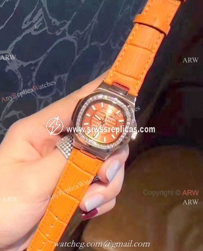 Copy Patek Philippe Nautilus Womens Watch Diamond Bezel Orange Watch