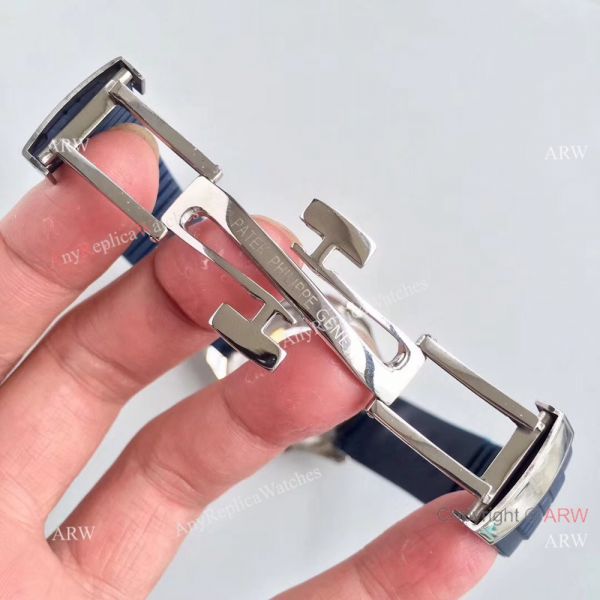 Replica Swiss Patek Philippe Travel Time Watch SS Blue Rubber Strap Replica Swiss Patek Philippe Travel Time Watch SS Blue Rubber Strap