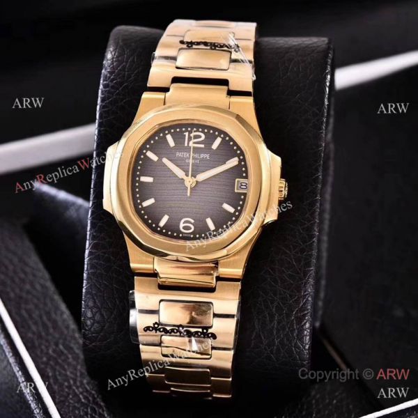 Copy Patek Philippe Nautilus Womens Yellow Gold and Blue Swiss Quality Copy Patek Philippe Nautilus Womens Yellow Gold and Blue Swiss Quality