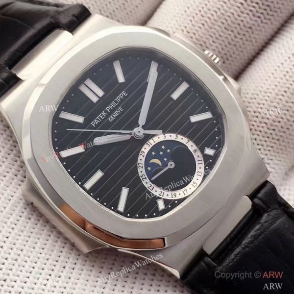 Swiss Grade 1 Patek Philippe Moonphase Replica Watch Nautilus Black Dial 40mm Swiss Grade 1 Patek Philippe Moonphase Replica Watch Nautilus Black Dial 40mm