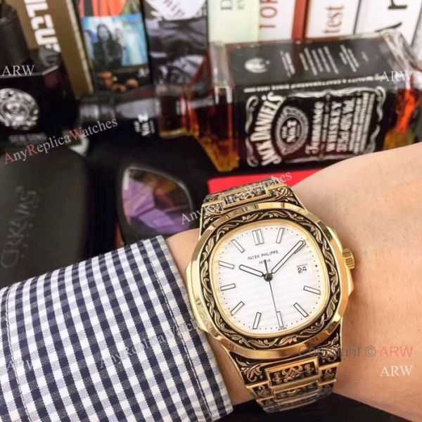 2019 Copy Patek Philippe Engraving Nautilus Watches Yellow Gold Black Dial 2019 Copy Patek Philippe Engraving Nautilus Watches Yellow Gold Black Dial