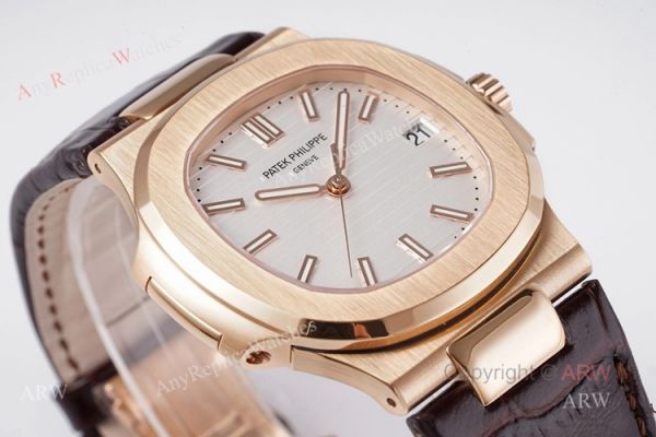 Swiss Replica Patek Philippe Nautilus Watches Rose Gold Case With White Dial Swiss Replica Patek Philippe Nautilus Watches Rose Gold Case With White Dial
