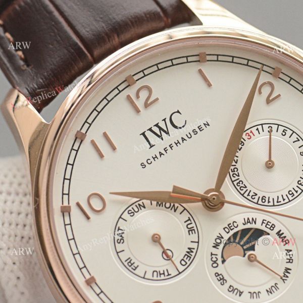 Replica IWC Portuguese Moonphase Gold Case White Face Watch Replica IWC Portuguese Moonphase Gold Case White Face Watch