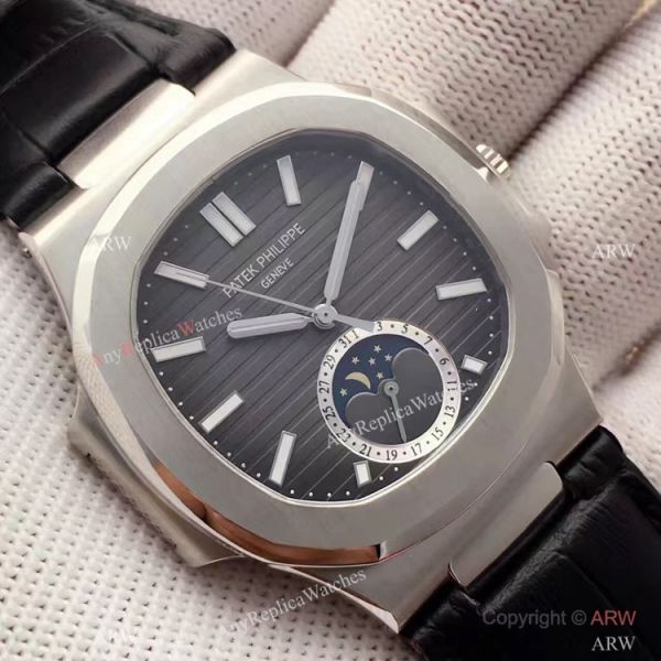Swiss Grade 1 Patek Philippe Moonphase Replica Watch Nautilus Black Dial 40mm Swiss Grade 1 Patek Philippe Moonphase Replica Watch Nautilus Black Dial 40mm