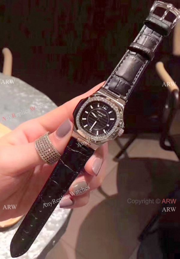 Copy Patek Philippe Nautilus Womens Watch Diamond Bezel Orange Watch Copy Patek Philippe Nautilus Womens Watch Diamond Bezel Orange Watch