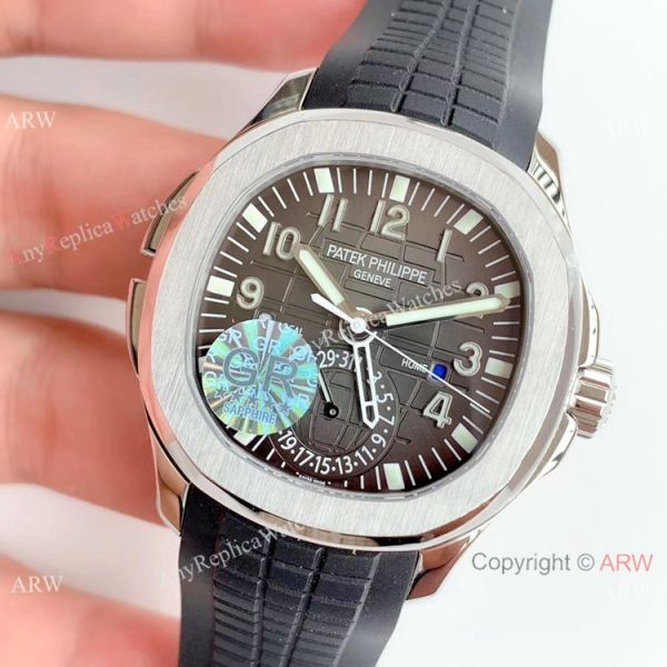 (GR) Swiss Replica Patek Philippe Aquanaut Travel Time Men Watch SS Gray Dial (GR) Swiss Replica Patek Philippe Aquanaut Travel Time Men Watch SS Gray Dial