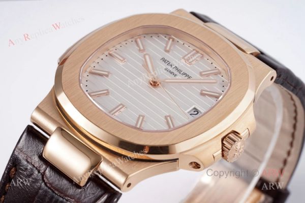 Swiss Replica Patek Philippe Nautilus Watches Rose Gold Case With White Dial Swiss Replica Patek Philippe Nautilus Watches Rose Gold Case With White Dial