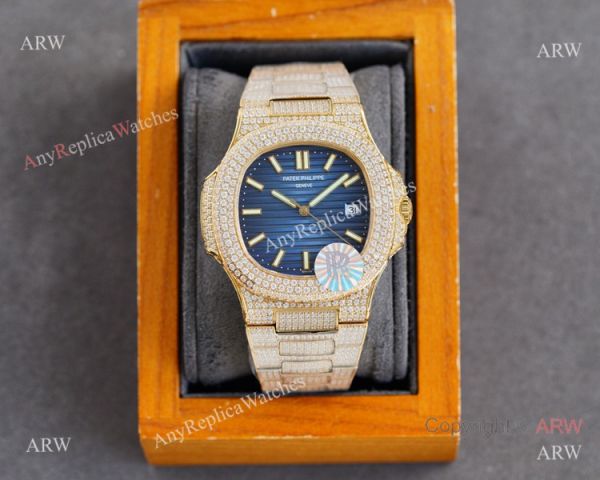 Swiss AAA Replica Patek Philippe Nautilus Iced Out Yellow Gold Watch 40mm 9015 Ultra-thin Movement Swiss AAA Replica Patek Philippe Nautilus Iced Out Yellow Gold Watch 40mm 9015 Ultra-thin Movement