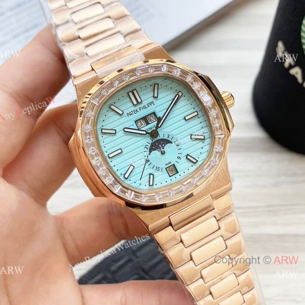 New Clone Patek Philippe Nautilus Annual Calendar Watch Baby Blue Face with Diamonds New Clone Patek Philippe Nautilus Annual Calendar Watch Baby Blue Face with Diamonds