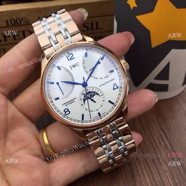 Replica IWC Portuguese Black Face Watch Two Tone Rose Gold Moonphase Replica IWC Portuguese Black Face Watch Two Tone Rose Gold Moonphase