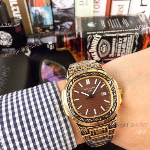 2019 Copy Patek Philippe Engraving Nautilus Watches Yellow Gold Black Dial 2019 Copy Patek Philippe Engraving Nautilus Watches Yellow Gold Black Dial