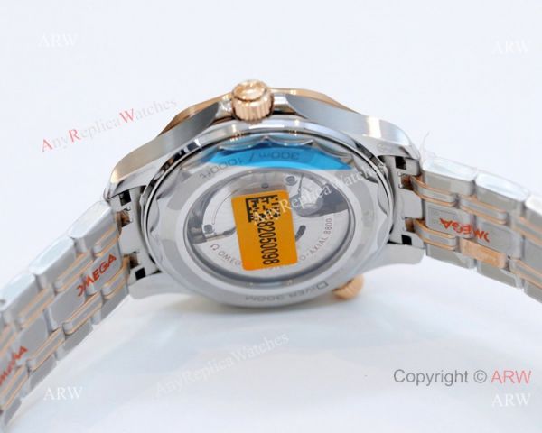 2021 Latest Swiss Replica Omega Seamaster Diver 300M OR 8800 Watch Two Tone Rose Gold Blue Dial 2021 Latest Swiss Replica Omega Seamaster Diver 300M OR 8800 Watch Two Tone Rose Gold Blue Dial