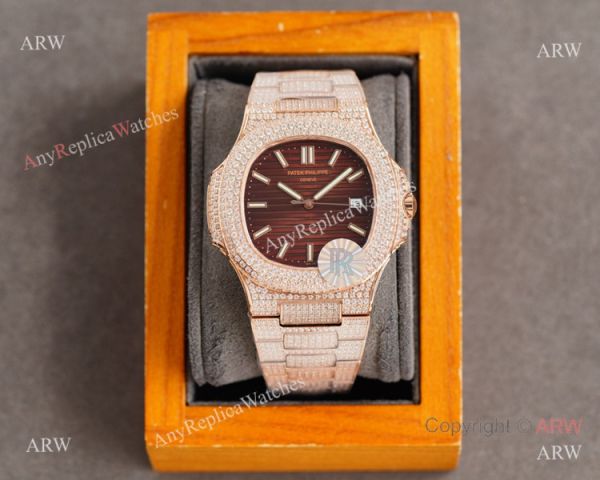 Swiss AAA Replica Patek Philippe Nautilus 9015 Ultra-thin Watch Rose Gold Iced Out Black Dial 40mm Swiss AAA Replica Patek Philippe Nautilus 9015 Ultra-thin Watch Rose Gold Iced Out Black Dial 40mm