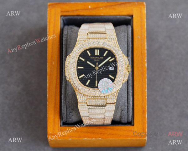 Swiss AAA Replica Patek Philippe Nautilus Iced Out Yellow Gold Watch 40mm 9015 Ultra-thin Movement Swiss AAA Replica Patek Philippe Nautilus Iced Out Yellow Gold Watch 40mm 9015 Ultra-thin Movement