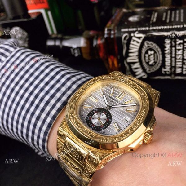 New Fake Patek Philippe Engraving Nautilus Silver Face Yellow Gold Watch For Sale New Fake Patek Philippe Engraving Nautilus Silver Face Yellow Gold Watch For Sale