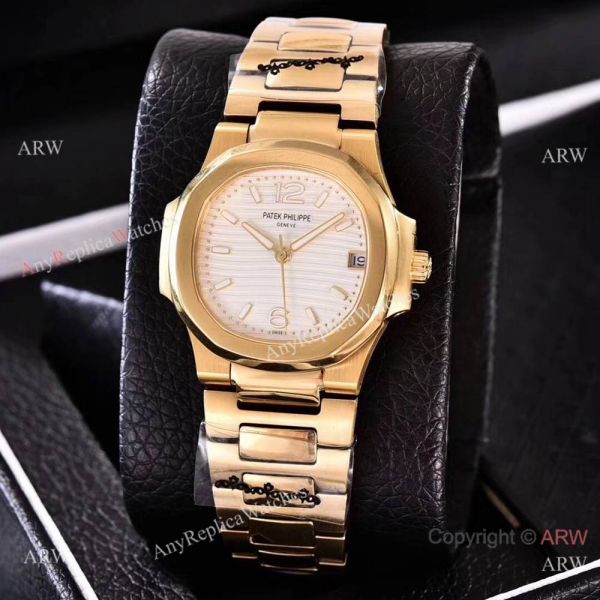 Copy Patek Philippe Nautilus Womens Yellow Gold and Blue Swiss Quality Copy Patek Philippe Nautilus Womens Yellow Gold and Blue Swiss Quality