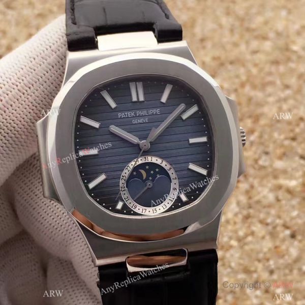 Swiss Grade 1 Patek Philippe Moonphase Replica Watch Nautilus Black Dial 40mm Swiss Grade 1 Patek Philippe Moonphase Replica Watch Nautilus Black Dial 40mm