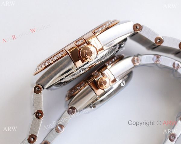 Swiss Quality Clone Omega Double Eagle Couple Watches Silver Dial Diamond Bezel 38mm and 27mm Swiss Quality Clone Omega Double Eagle Couple Watches Silver Dial Diamond Bezel 38mm and 27mm
