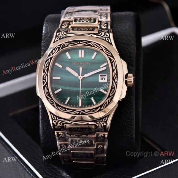 Clone Patek Philippe Nautilus Gold Tattoo Wrist Malachite Green Dial Clone Patek Philippe Nautilus Gold Tattoo Wrist Malachite Green Dial