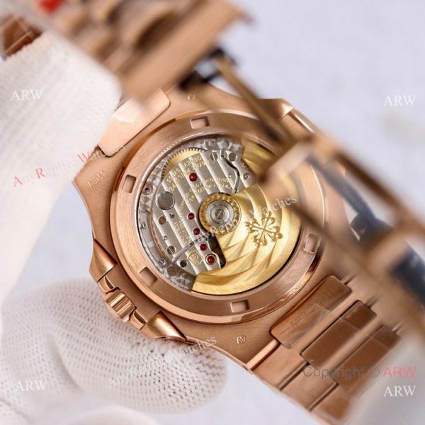 Swiss Copy Patek Philippe Rose Gold Black Dial Nautilus Watch PPF Cal.324 40mm Swiss Copy Patek Philippe Rose Gold Black Dial Nautilus Watch PPF Cal.324 40mm