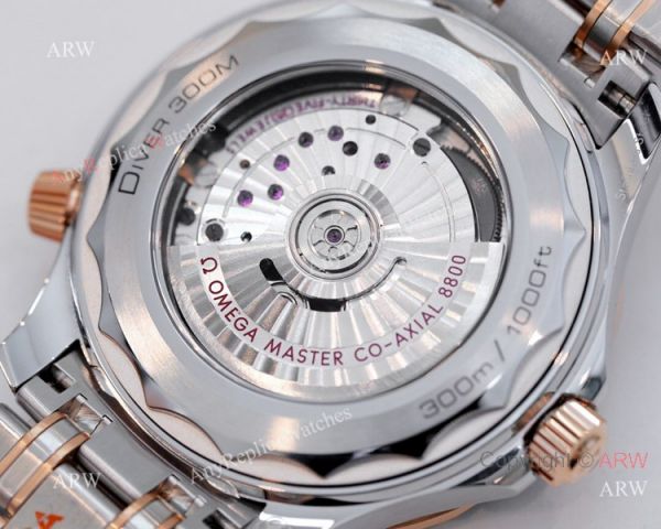 2021 Latest Swiss Replica Omega Seamaster Diver 300M OR 8800 Watch Two Tone Rose Gold Blue Dial 2021 Latest Swiss Replica Omega Seamaster Diver 300M OR 8800 Watch Two Tone Rose Gold Blue Dial