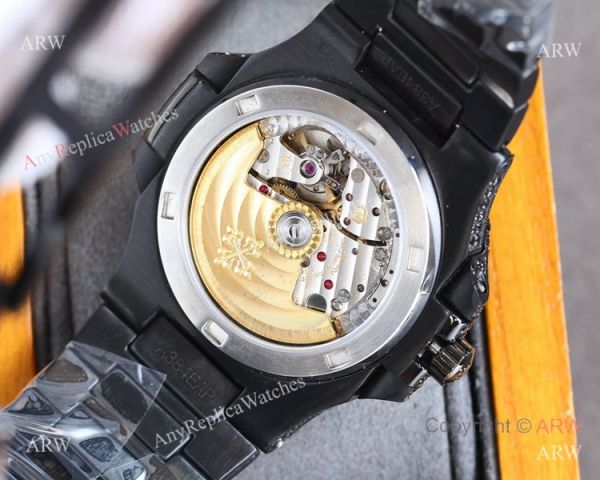 Swiss Grade One Patek Philippe Nautilus Iced Out 9015 Watch Solid Black Swiss Grade One Patek Philippe Nautilus Iced Out 9015 Watch Solid Black