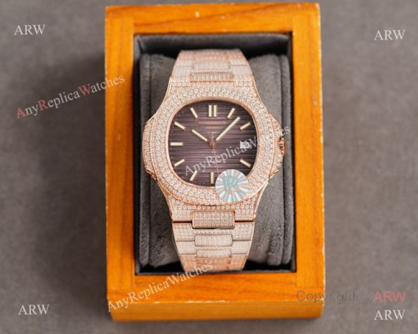 Swiss AAA Replica Patek Philippe Nautilus 9015 Ultra-thin Watch Rose Gold Iced Out Black Dial 40mm Swiss AAA Replica Patek Philippe Nautilus 9015 Ultra-thin Watch Rose Gold Iced Out Black Dial 40mm