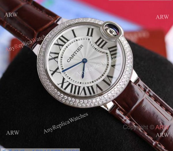 Replica V6 Cartier Balloon Blue Diamond Bezel White Face Watch Brown Leather Strap Replica V6 Cartier Balloon Blue Diamond Bezel White Face Watch Brown Leather Strap