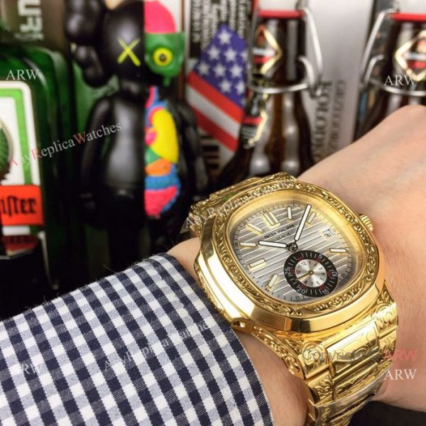 New Fake Patek Philippe Engraving Nautilus Silver Face Yellow Gold Watch For Sale New Fake Patek Philippe Engraving Nautilus Silver Face Yellow Gold Watch For Sale