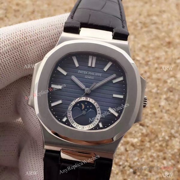 Swiss Grade 1 Patek Philippe Moonphase Replica Watch Nautilus Black Dial 40mm Swiss Grade 1 Patek Philippe Moonphase Replica Watch Nautilus Black Dial 40mm