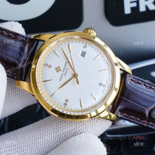 New Patek Philippe Calatrava Replica Watch Gold Dial With Brown Leather Band New Patek Philippe Calatrava Replica Watch Gold Dial With Brown Leather Band