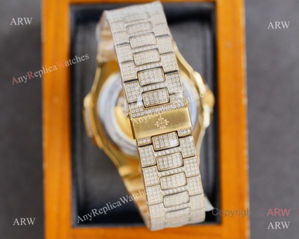 Swiss AAA Replica Patek Philippe Nautilus Iced Out Yellow Gold Watch 40mm 9015 Ultra-thin Movement Swiss AAA Replica Patek Philippe Nautilus Iced Out Yellow Gold Watch 40mm 9015 Ultra-thin Movement