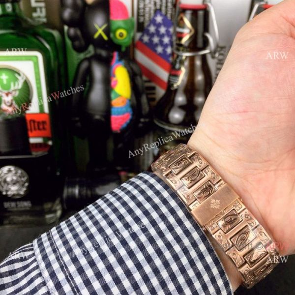 New Copy Patek Philippe Engraving Nautilus Rose Gold Dial Men Wristwatch New Copy Patek Philippe Engraving Nautilus Rose Gold Dial Men Wristwatch