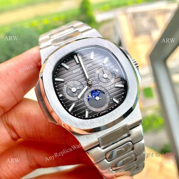 New Patek Philippe Nautilus Annual Calendar Moonphase Watch SS White Dial 42 MM New Patek Philippe Nautilus Annual Calendar Moonphase Watch SS White Dial 42 MM
