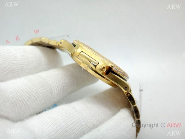 Swiss Replica Patek Philippe Nautilus Jumbo Gold Iced Out Watch 39.5mm Swiss Replica Patek Philippe Nautilus Jumbo Gold Iced Out Watch 39.5mm