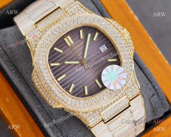 Swiss AAA Replica Patek Philippe Nautilus Iced Out Yellow Gold Watch 40mm 9015 Ultra-thin Movement Swiss AAA Replica Patek Philippe Nautilus Iced Out Yellow Gold Watch 40mm 9015 Ultra-thin Movement
