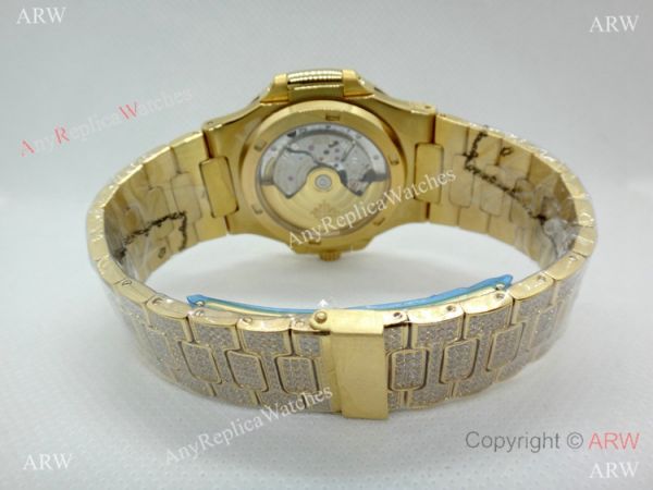 Swiss Replica Patek Philippe Nautilus Jumbo Gold Iced Out Watch 39.5mm Swiss Replica Patek Philippe Nautilus Jumbo Gold Iced Out Watch 39.5mm