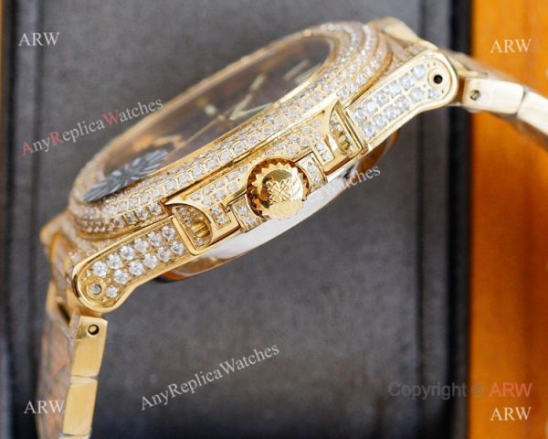 Swiss AAA Replica Patek Philippe Nautilus Iced Out Yellow Gold Watch 40mm 9015 Ultra-thin Movement Swiss AAA Replica Patek Philippe Nautilus Iced Out Yellow Gold Watch 40mm 9015 Ultra-thin Movement