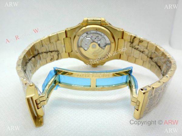 Swiss Replica Patek Philippe Nautilus Jumbo Gold Iced Out Watch 39.5mm Swiss Replica Patek Philippe Nautilus Jumbo Gold Iced Out Watch 39.5mm