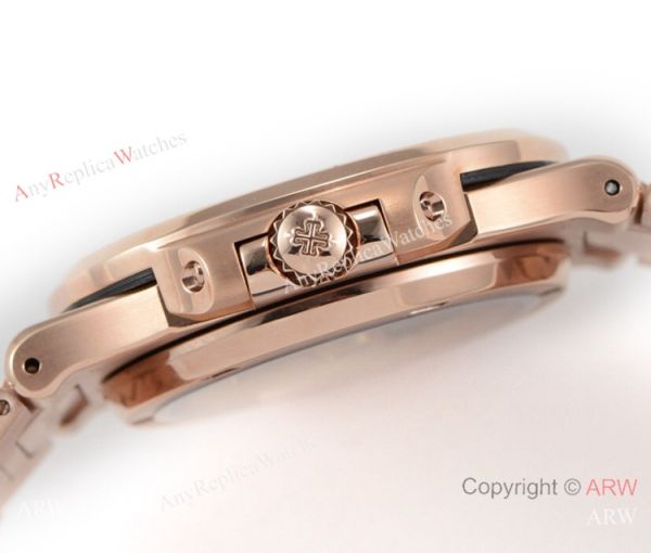 (OE) Swiss Replica Patek Philippe 5713 G Nautilus Watch Rose Gold White Face (OE) Swiss Replica Patek Philippe 5713 G Nautilus Watch Rose Gold White Face