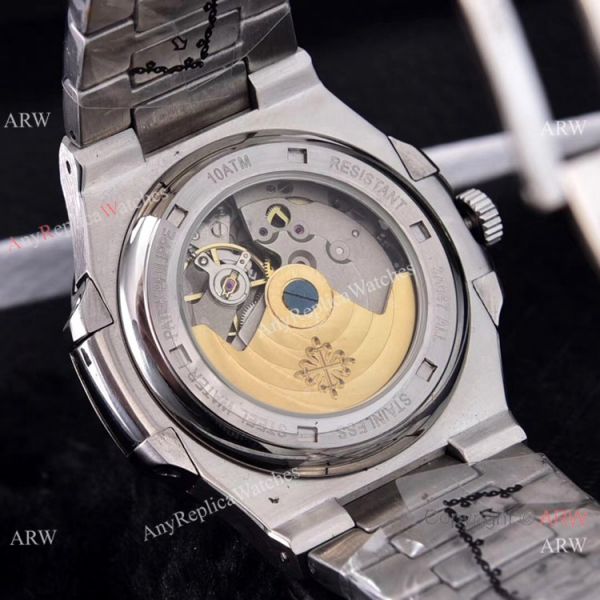 Clone Patek Philippe Nautilus Silver Tattoo Wrist Purple Dial 40mm Clone Patek Philippe Nautilus Silver Tattoo Wrist Purple Dial 40mm