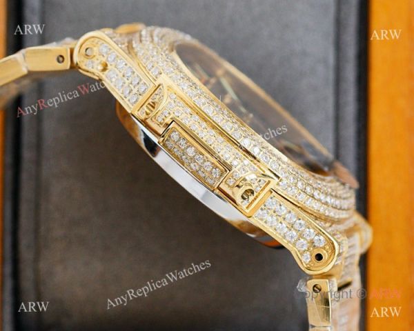 Swiss AAA Replica Patek Philippe Nautilus Iced Out Yellow Gold Watch 40mm 9015 Ultra-thin Movement Swiss AAA Replica Patek Philippe Nautilus Iced Out Yellow Gold Watch 40mm 9015 Ultra-thin Movement