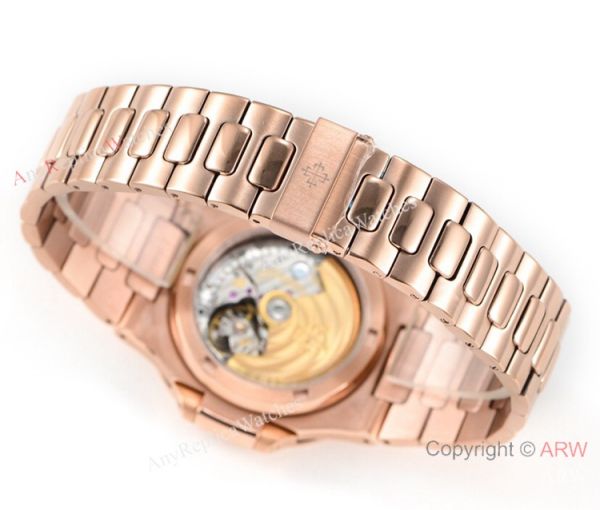 (OE)Swiss Copy Patek Philippe Nautilus 5713g Brown Dial Diamond Watch 40mm (OE)Swiss Copy Patek Philippe Nautilus 5713g Brown Dial Diamond Watch 40mm