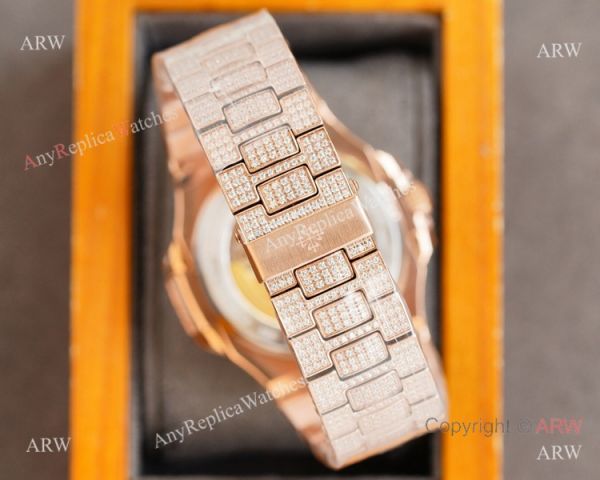 Swiss AAA Replica Patek Philippe Nautilus 9015 Ultra-thin Watch Rose Gold Iced Out Black Dial 40mm Swiss AAA Replica Patek Philippe Nautilus 9015 Ultra-thin Watch Rose Gold Iced Out Black Dial 40mm